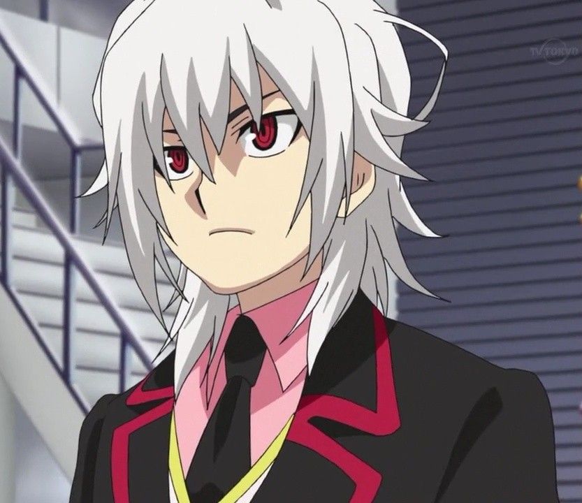 Shu wearing a black suit, accented with red to match his eyes.
